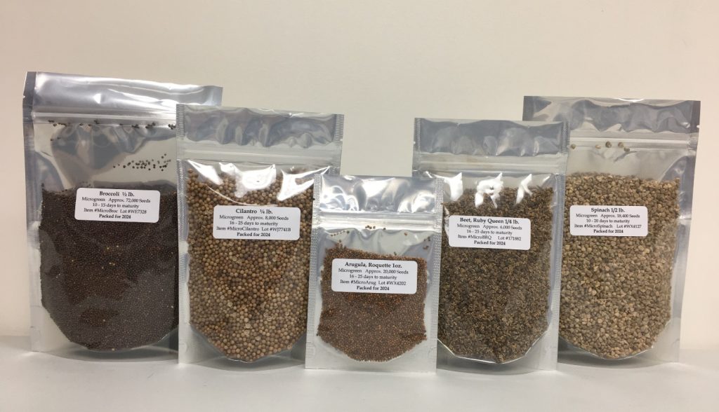 Assorted open pollinated heirloom seeds for microgreens including broccoli, spinach, and cilantro